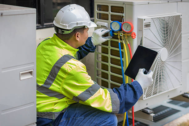 Professional Hvac technician working in Ivins, UT